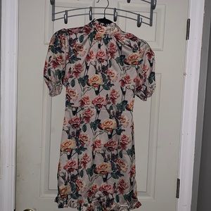 Cute floral body con fit dress.